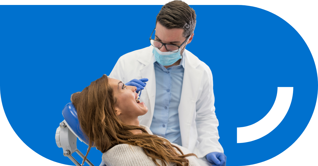 Dentist Siting on Dental Chair